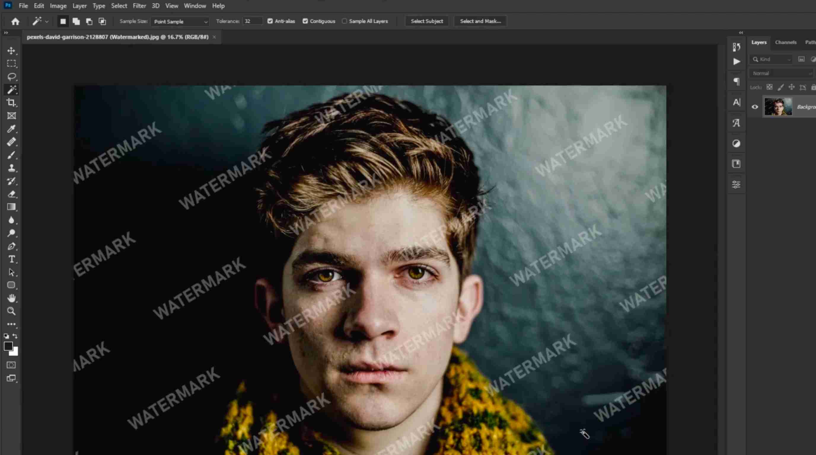 How to remove watermarks from photo in Photoshop Open the photo in Photoshop