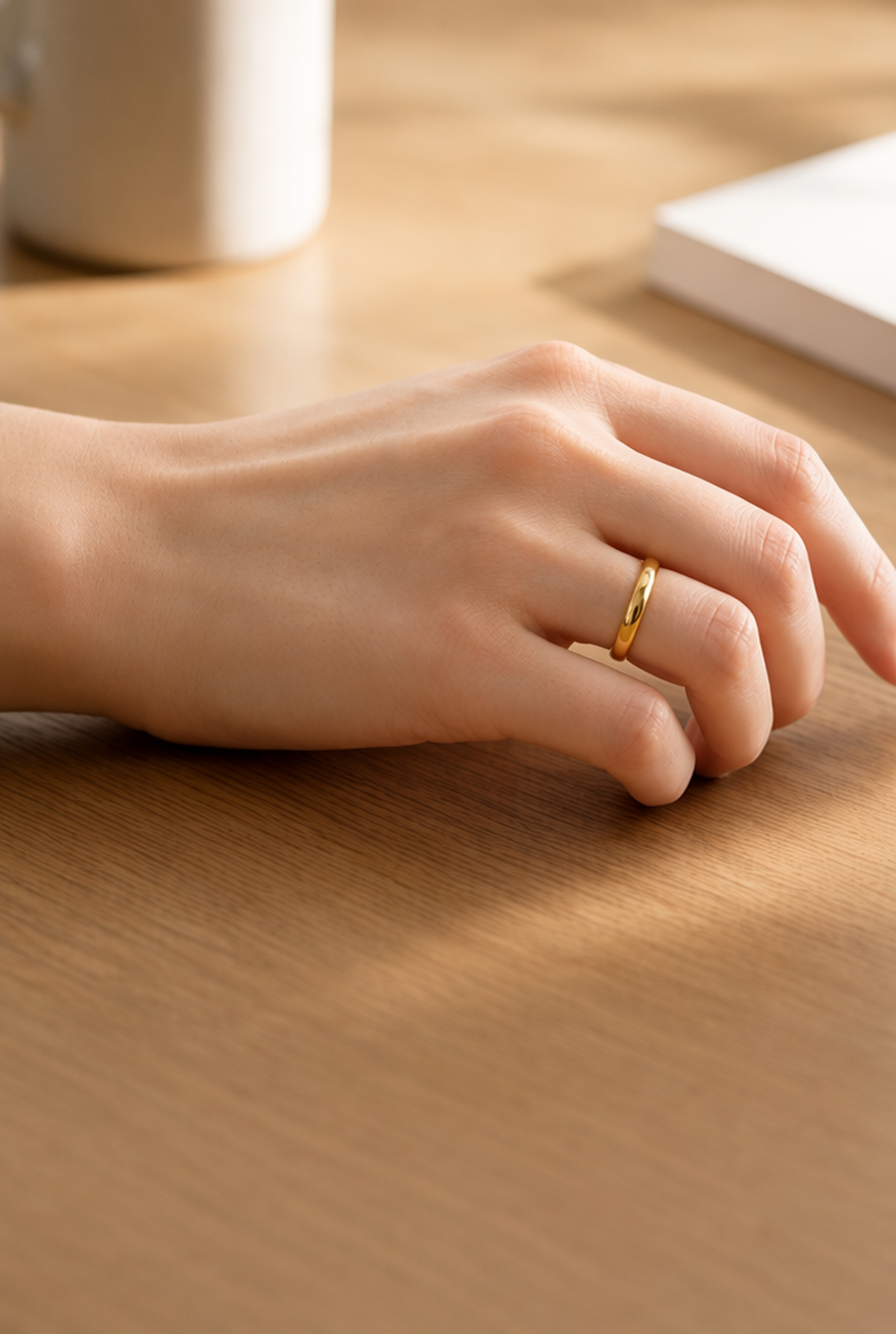 Gold wedding band virtually placed on the hand